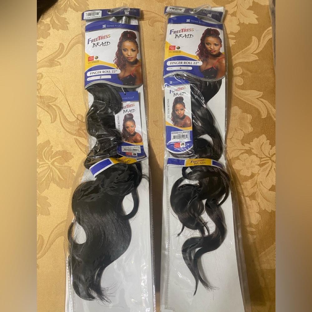 New style FreeTress designed hair for braiding or pony tails .